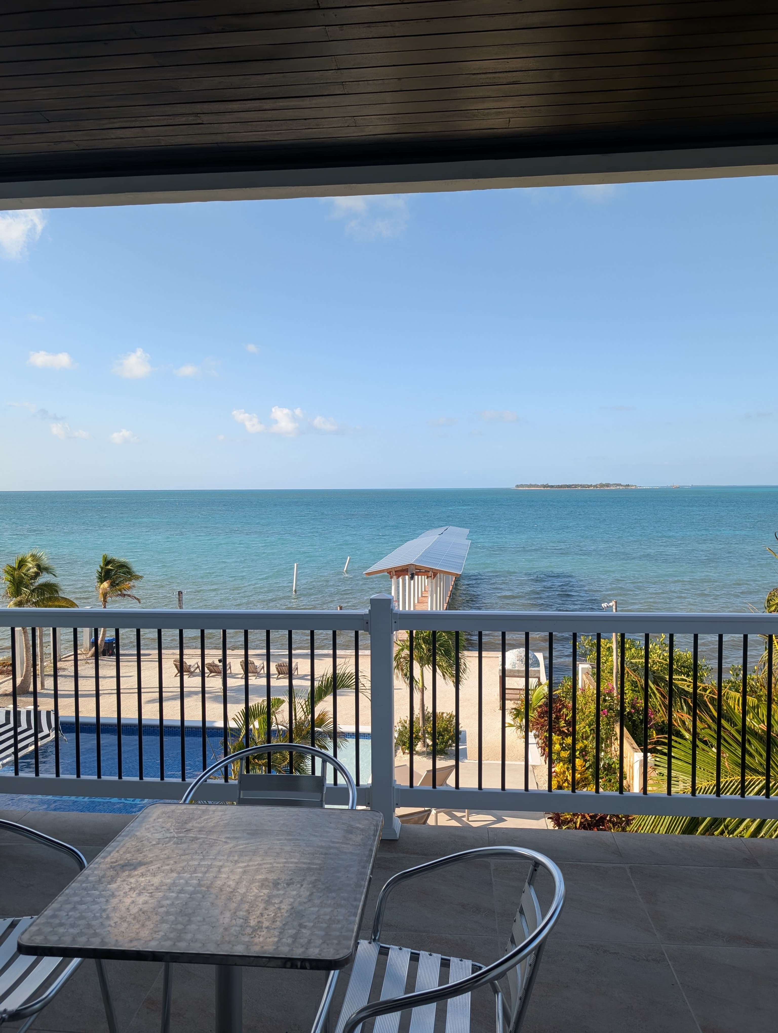 Balcony view of the ocean and pool second floor