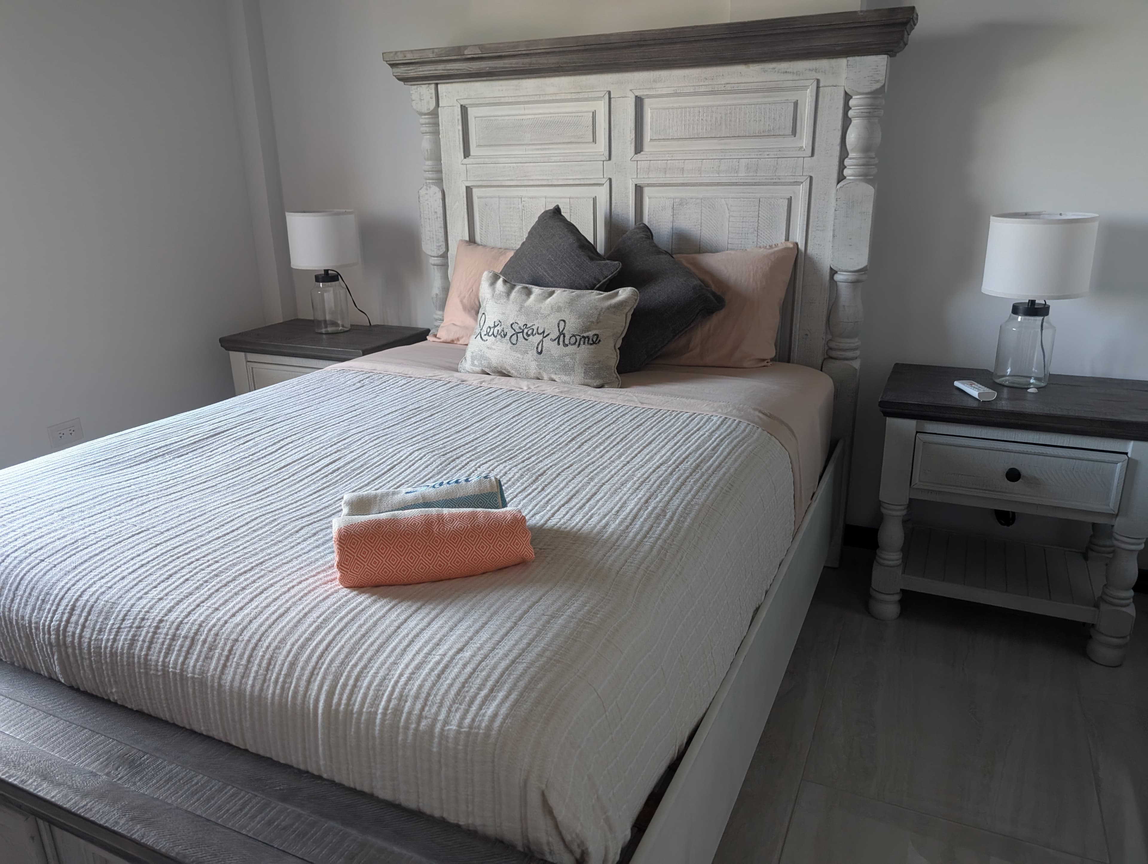 second bedroom with queen bed modern furntiure