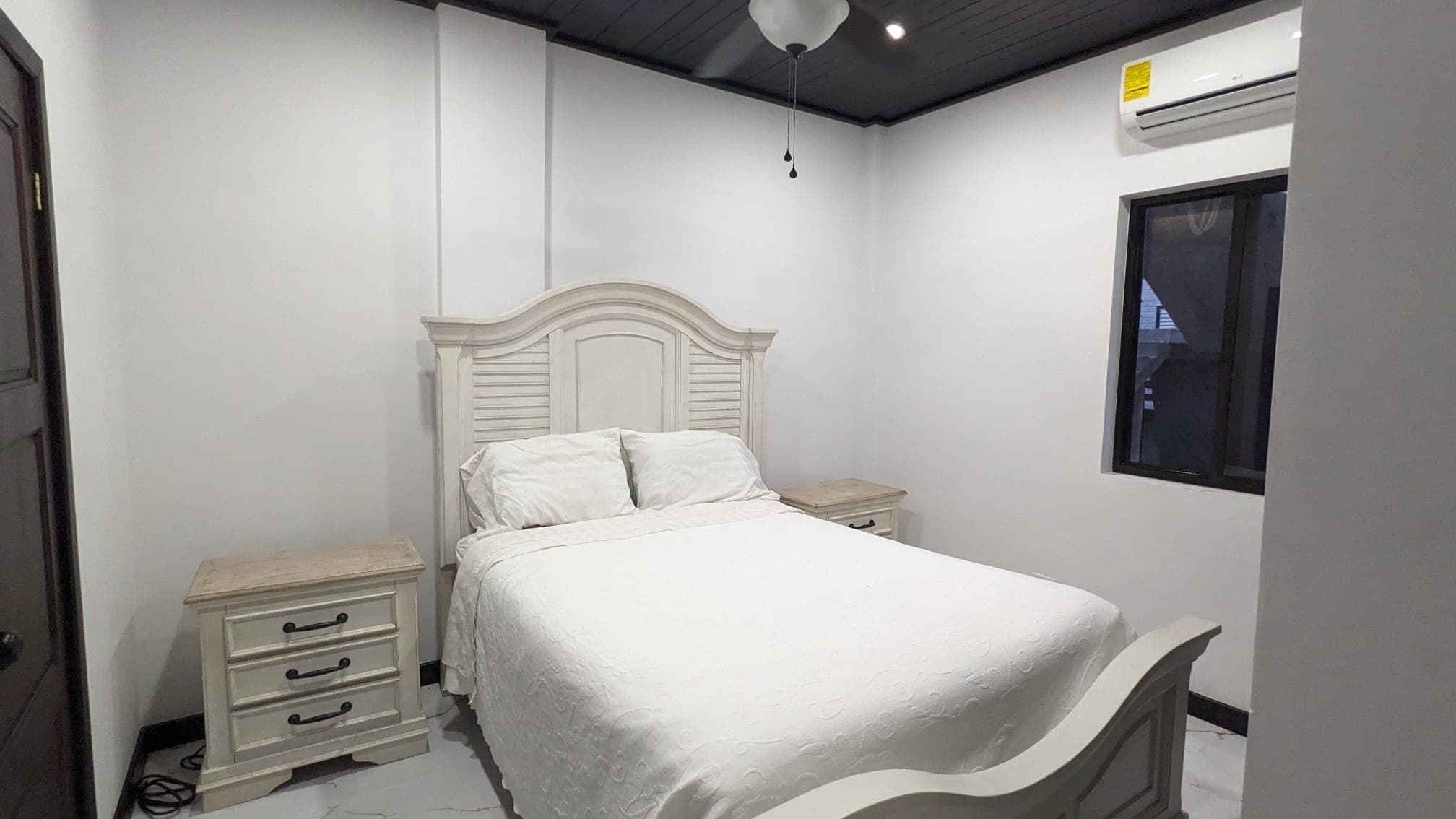 second bedroom with queen bed modern furntiure